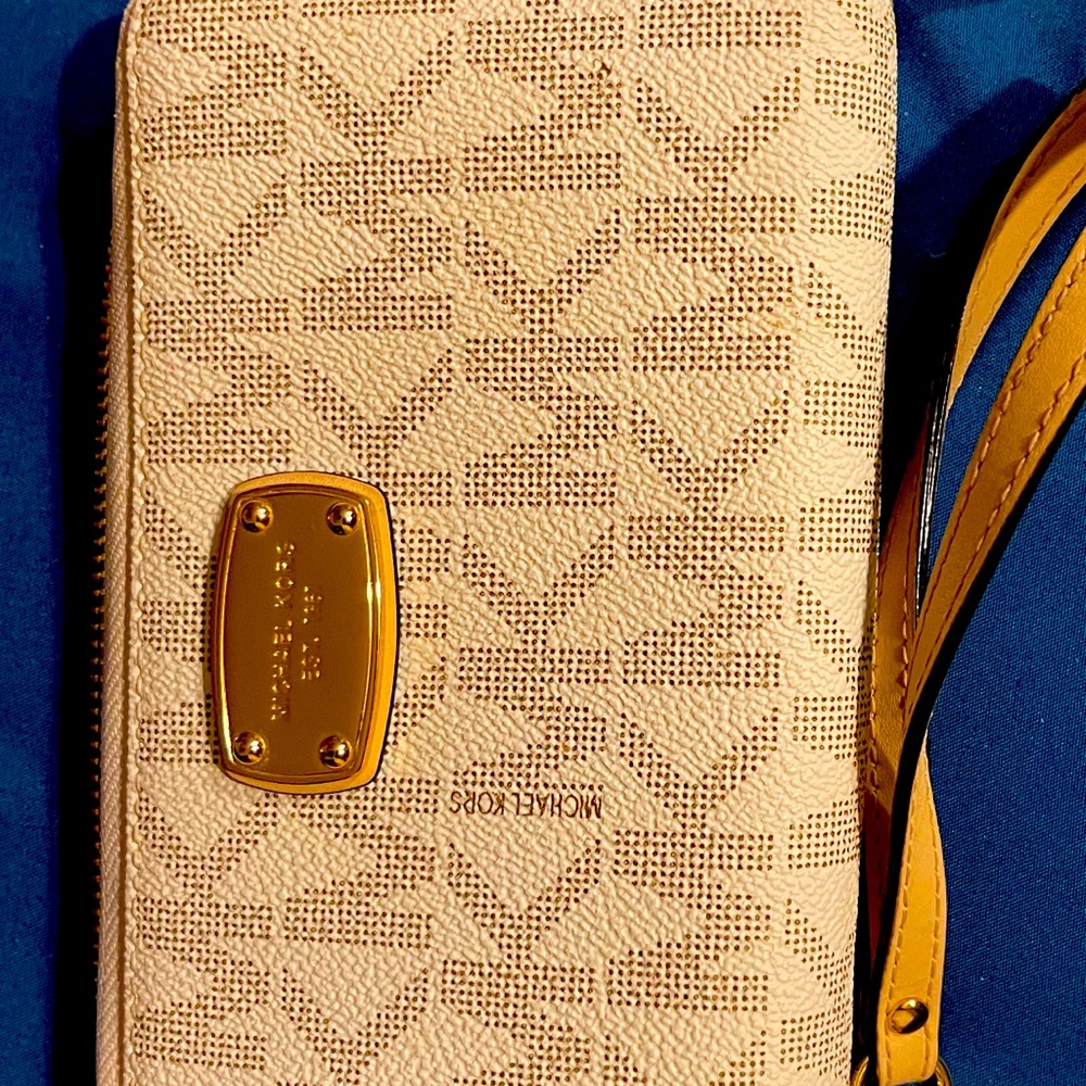Beautiful authentic Michael kors phone case and wallet